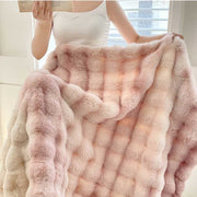 Quilted Faux-Fur Pile Throw — folded throw showing texture and weight