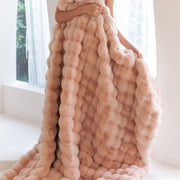 Bubble-Texture Fleece Throw Blanket — folded throw showing texture and weight