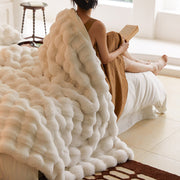 Sculpted Bubble-Pile Plush Throw — folded throw showing texture and weight