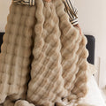 Sculpted Bubble-Pile Plush Throw — Sculpted faux-fur throw with bubble-channel texture and solid woven reverse