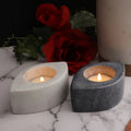 Carved Marble Tea Light Holder Set — Paired marble tea light holders in white and charcoal, hand-carved with natural veining