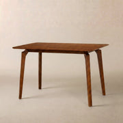Curved-Leg Solid Wood Dining Table — FSC-certified solid wood dining table with curved legs, seats four comfortably