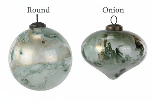 Two sage green with cream ornaments with marbled, spherical and teardrop