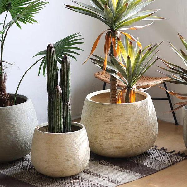 Scored Globe Cement Planter — globe-form magnesium oxide planter with horizontal scoring, two colors, two sizes