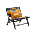 Patchwork Leather Sling Accent Chair styled on a sunlit patio with side table