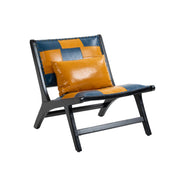 Patchwork Leather Sling Accent Chair styled on a sunlit patio with side table