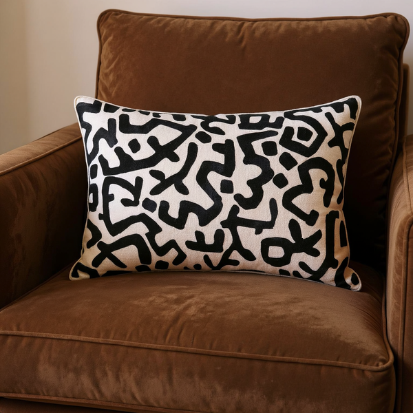 Abstract Print Cotton Slub Lumbar Pillow styled on coordinated seating