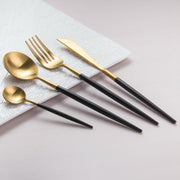 Matte Black and Gold Flatware Set in a styled home setting
