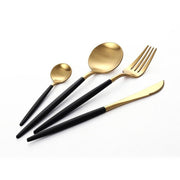 Close-up of hand-thrown stoneware glaze and texture detail — Matte Black and Gold Flatware Set