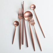 Matte Rose Gold Flatware Set in a styled home setting