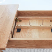 Extendable Oak Dining Table — close-up of label and production detail