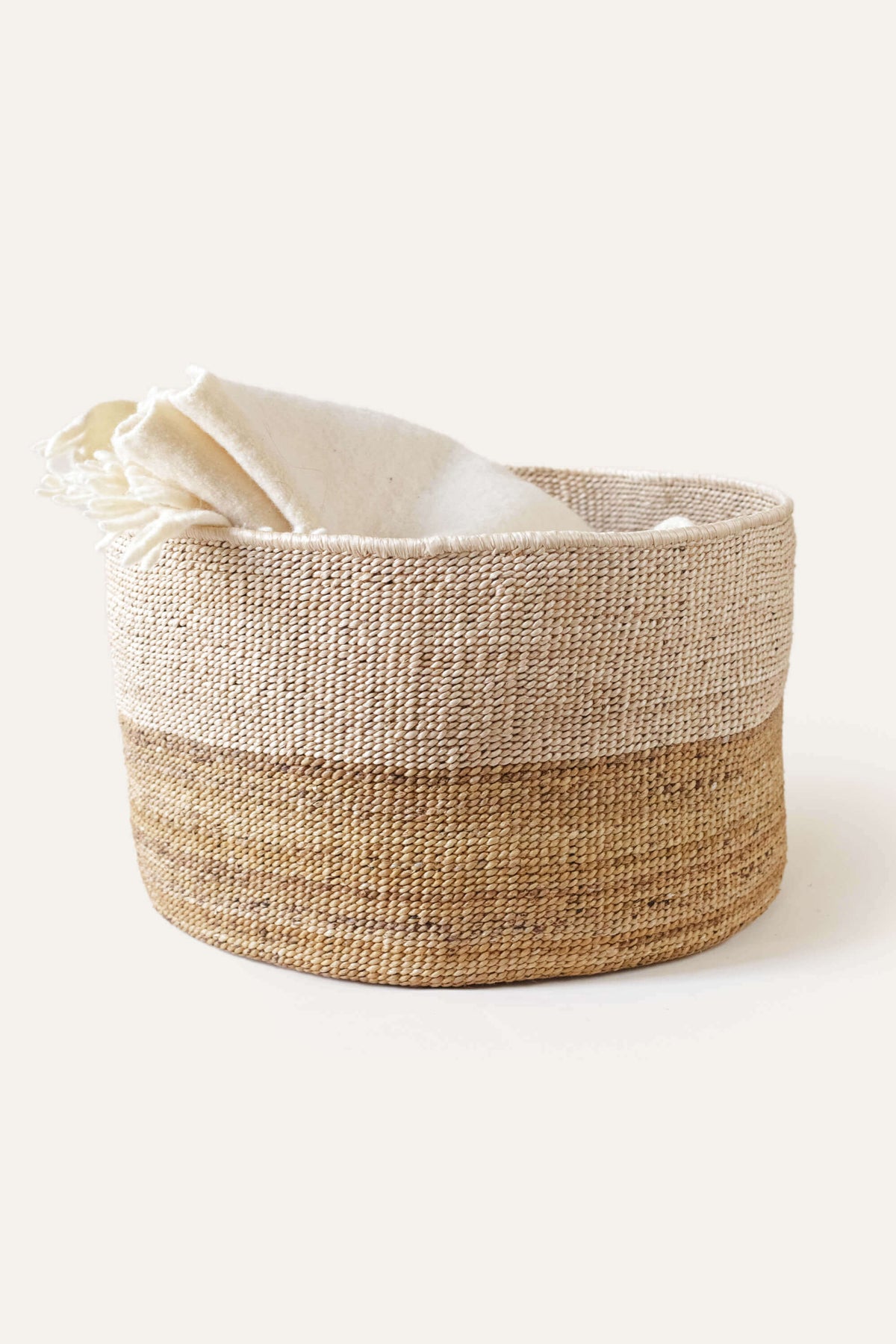 A low basket that holds the room together