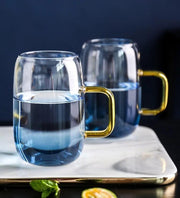 Ombre Glass Pitcher and Cup Set styled on a marble bar cart with glassware