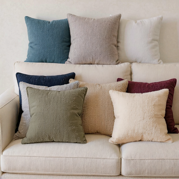 Boucle-Texture Memory Foam Throw Pillow color options styled together on coordinated seating