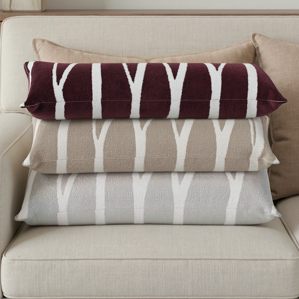 Bouclé-Finish Woodland Lumbar Pillow color options styled together on coordinated seating