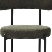 Boucle Crescent-Back Dining Chairs Set — close-up of label and production detail