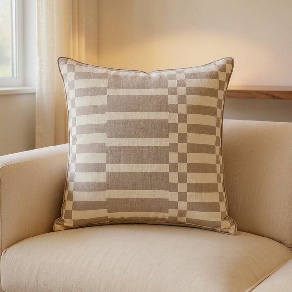 Cotton Slub Geometric Throw Pillow in a close view on coordinated upholstered seating