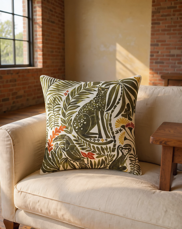 Cotton Wildlife Print Throw Pillow styled in a warm editorial loft