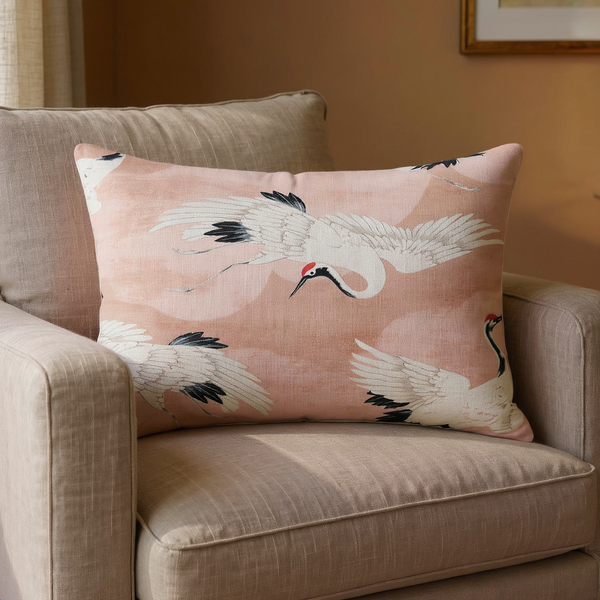 Crane Print Cotton Lumbar Pillow in a close view on coordinated upholstered seating