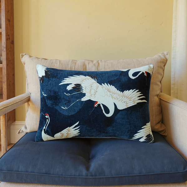 Crane Print Velvet Lumbar Pillow in a close view on coordinated upholstered seating