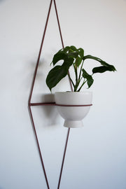 Diamond-Form Wire Wall Planter — close-up of label and production detail