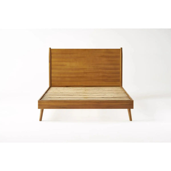 Honey-brown panel bed frame shown straight on against white with pale slats.