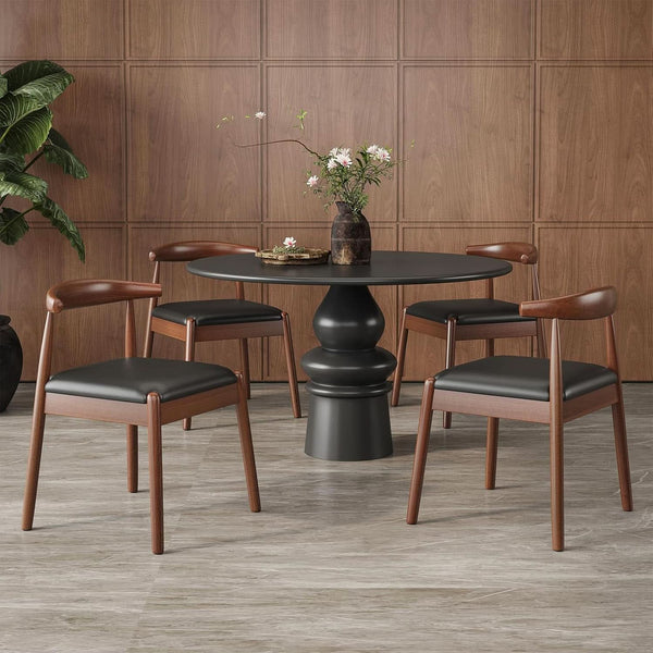 Four brown dining chairs