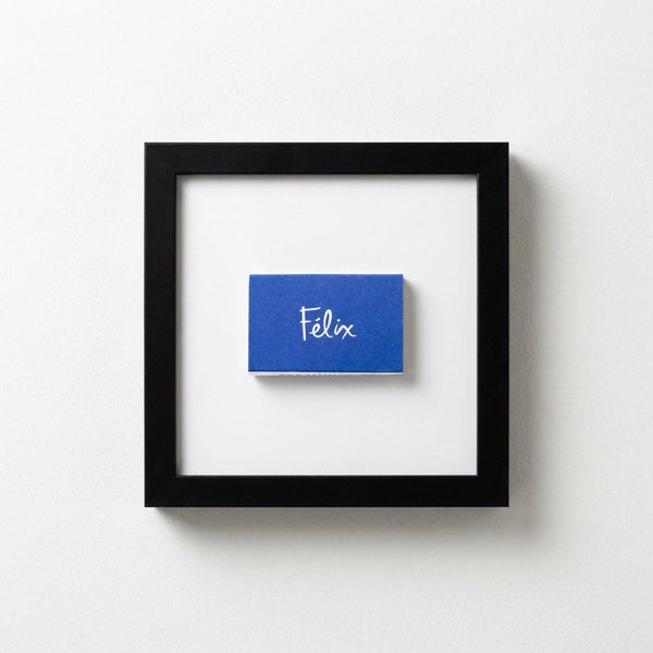 Wood-Frame Script Art Print — Cobalt script print in a wood-grain frame, available in three finishes