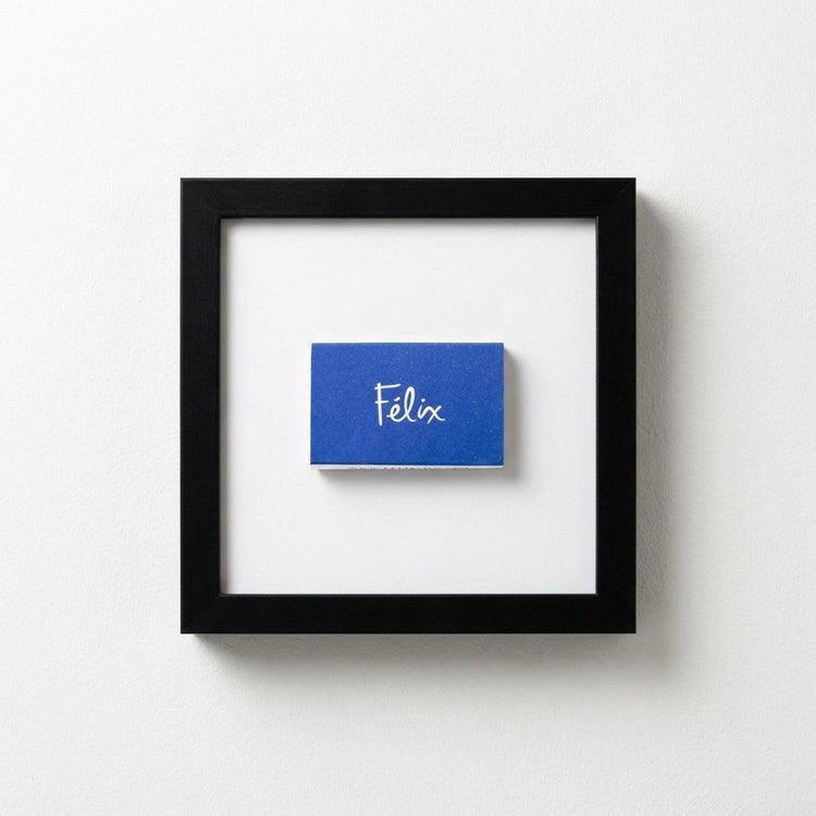 Wood-Frame Script Art Print — Cobalt script print in a wood-grain frame, available in three finishes