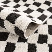 Black & Ivory Checkered Plush Rug