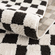 Black & Ivory Checkered Plush Rug