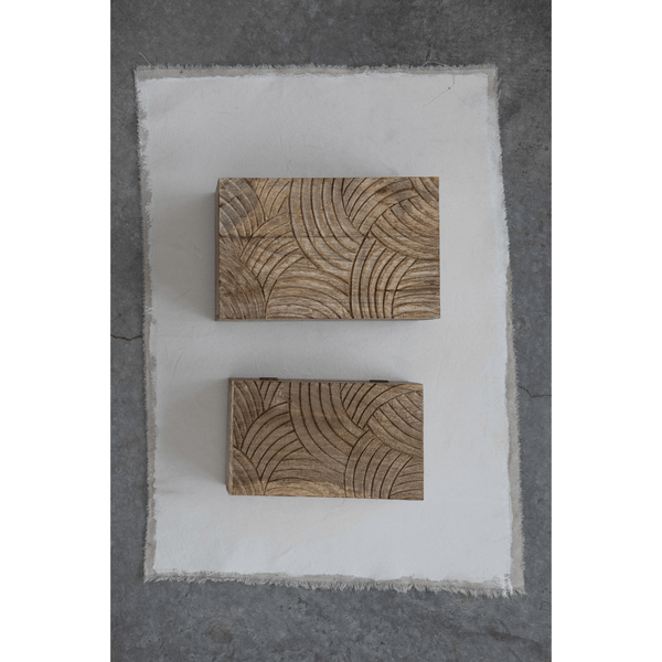 Hand-Carved Mango Wood Storage Boxes styled on a shelving unit in a living space