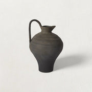 Matte Charcoal Terracotta Jug — Hand-shaped terracotta jug with matte charcoal wash and arched handle