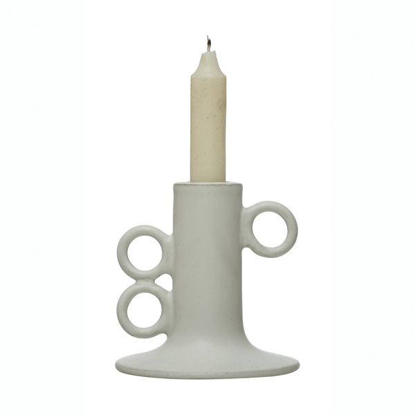 Stoneware Taper Candle Holder in White styled on a table with linen and ceramics