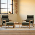 High-Back Wood Frame Accent Chair Set in a warm sunlit loft with cream plaster and a brick-framed window.