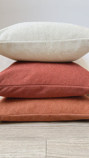Rust Bouclé-Texture Pillow Cover — alternate styling showing pillow grouped with coordinating textiles