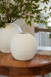 Textured Matte Ceramic Globe Vase styled with dried botanicals on a shelf