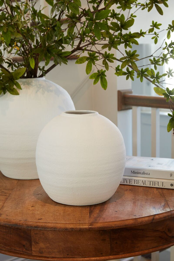 Textured Matte Ceramic Globe Vase styled with dried botanicals on a shelf