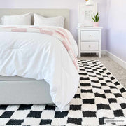 Black & Ivory Checkered Plush Rug