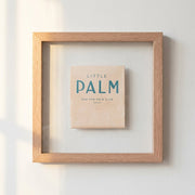 Wood-Frame Palm Bar Print — Typographic bar print in a wood-grain frame, two sizes available