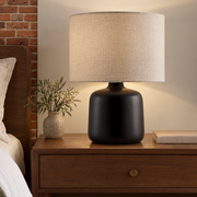 Matte Ceramic Drum Shade Table Lamp styled in a warm editorial loft