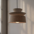 Tiered Organic Cotton Pendant Lamp — Three-tiered organic cotton pendant that diffuses light gently over dining tables and