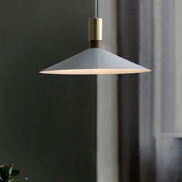 Matte Iron Cone Pendant Light in a styled room setting