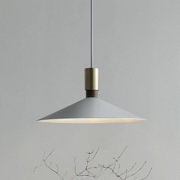 Matte Iron Cone Pendant Light in a styled room setting