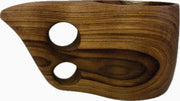 Carved Teak Wood Kuksa Mug holding a warm drink on a wooden table