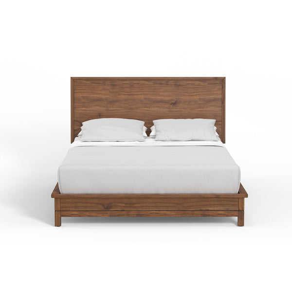 Honey-brown panel bed with white mattress and pillows shown straight on against white.