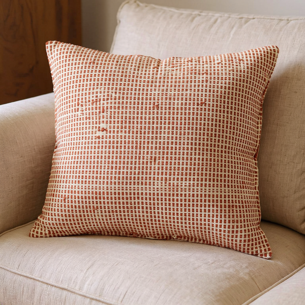 Pick-Up Weave Cotton Cushion in a close view on coordinated upholstered seating