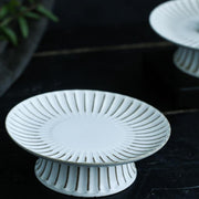 Ridged Ceramic Footed Cake Stand in a styled home setting