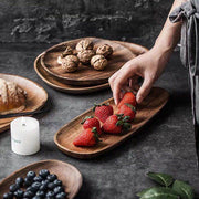 Oval Wood Serving Board Set in a styled home setting