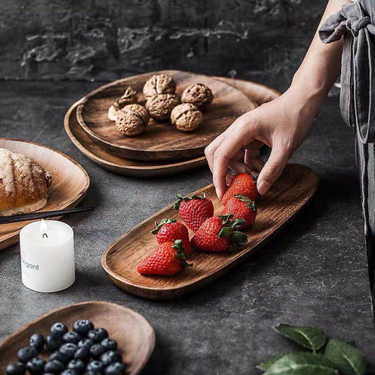 Oval Wood Serving Board Set in a styled home setting